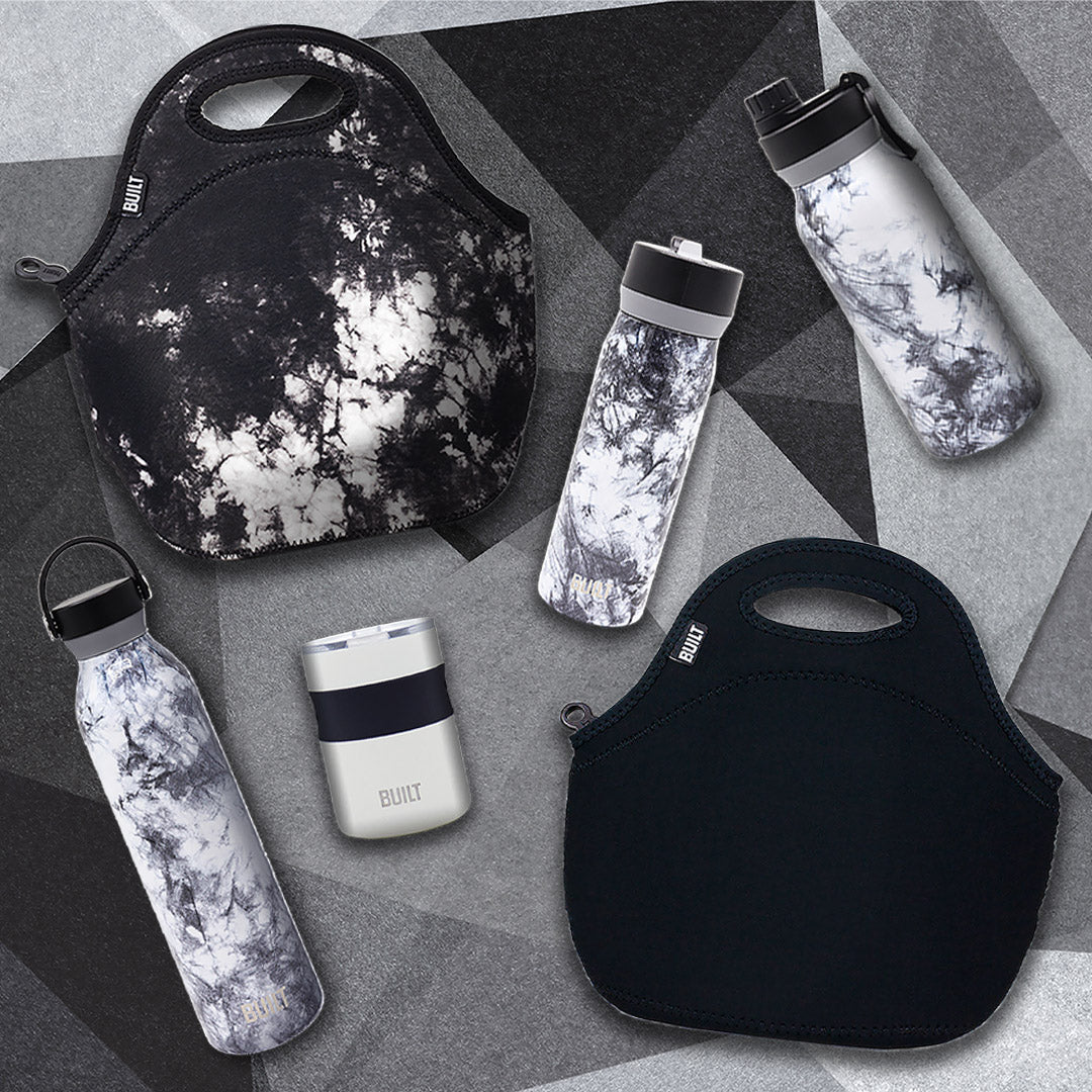 Tie-dye water bottles, tie-dye lunch bags, tie-dye tumblers in a collection